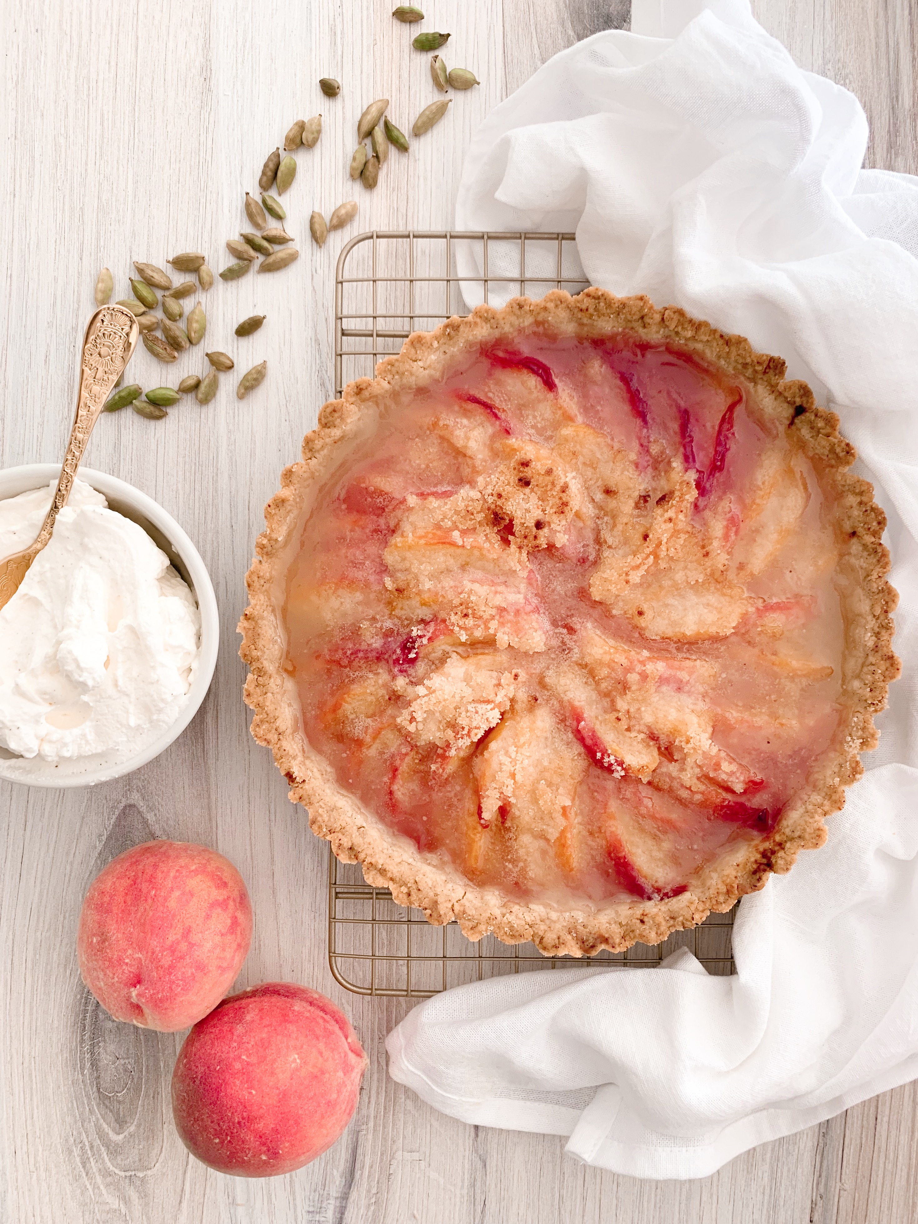 Mahlab Palisade Peach Tart with Cardamom Whipped Cream